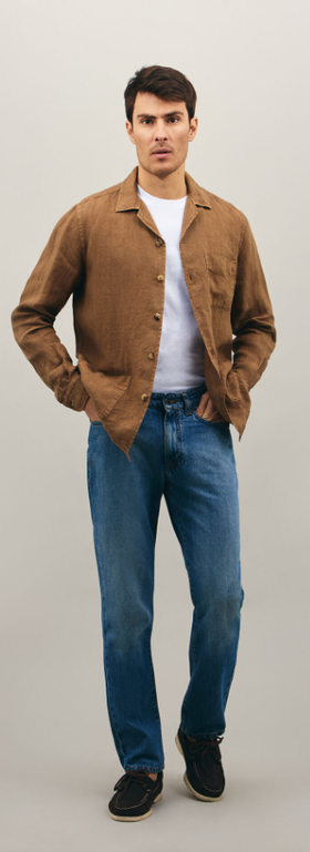 A man wearing Boglioli darkbeige linen painter shirt