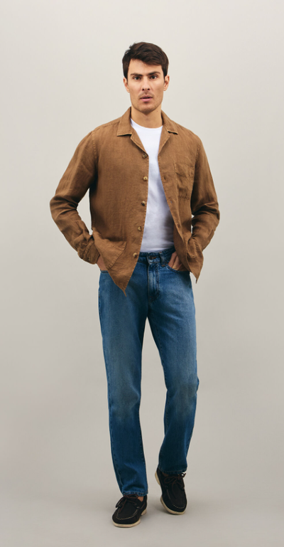 A man wearing Boglioli darkbeige linen painter shirt