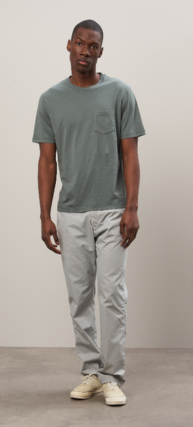 A man wearing Hartford olive green slub jersey tee shirt