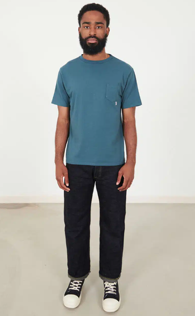 A man wearing Those That Know riding high standard pack pocket tee – blue