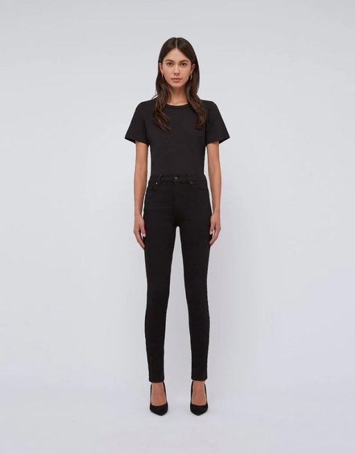 A woman wearing Baldwin Denim baldwin ultra high rise skinnyjean
