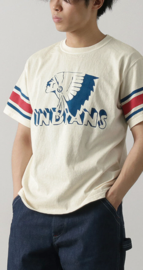 A man wearing Haku Clothing vintage sleeve indian s/s t-shirt