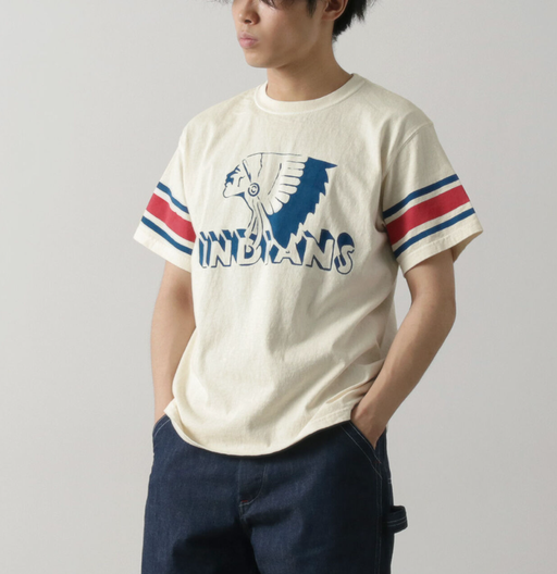 A man wearing Haku Clothing vintage sleeve indian s/s t-shirt