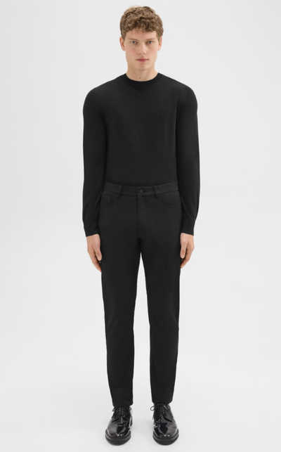 A man wearing J Brand raffi 5-pocket pant in neoteric twill