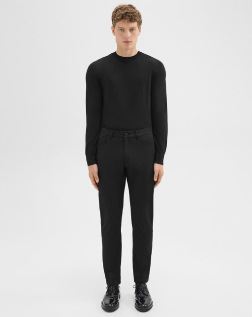 A man wearing J Brand raffi 5-pocket pant in neoteric twill