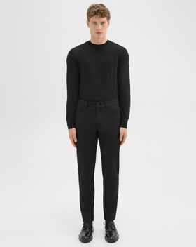 A man wearing J Brand raffi 5-pocket pant in neoteric twill