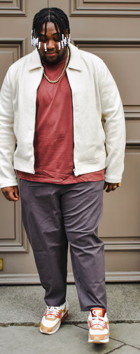 A man wearing a ASOS Curve asos design oversized jacket with crew neck in red