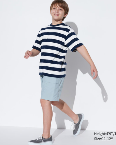 A boy wearing Uniqlo Kids airism cotton striped crew neck t-shirt