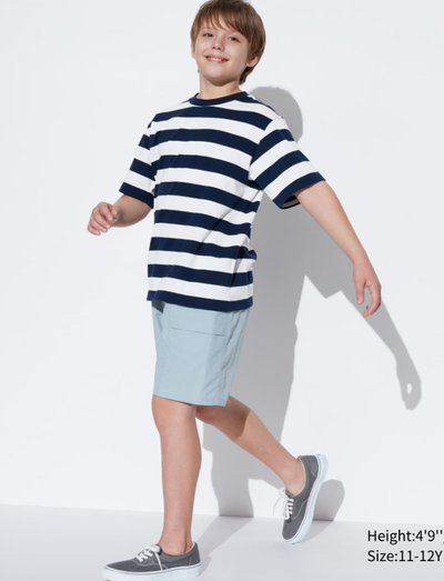 A boy wearing Uniqlo Kids airism cotton striped crew neck t-shirt