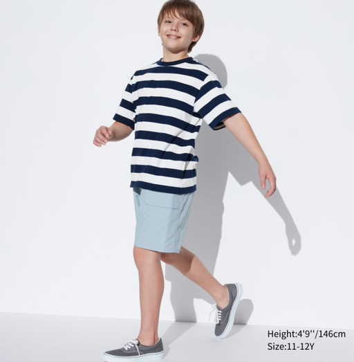 A boy wearing Uniqlo Kids airism cotton striped crew neck t-shirt