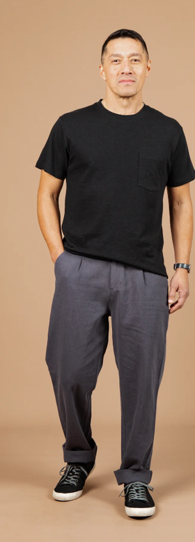 A man wearing Bridge & Burn washed black the organic hemp pocket tee