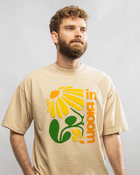 A man wearing Portland Gear all-american flower tee