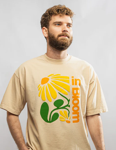 A man wearing Portland Gear all-american flower tee