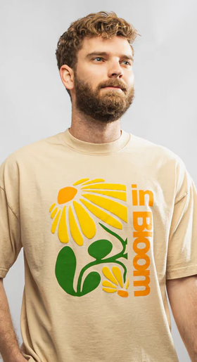 A man wearing Portland Gear all-american flower tee