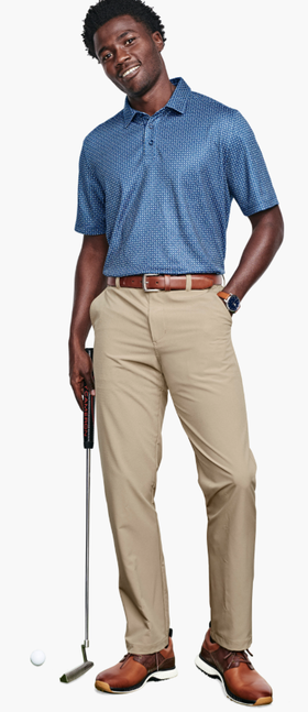 A man wearing a Johnston & Murphy navy geo xc4® performance polo