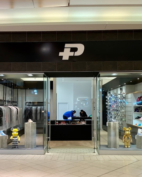 An inside look of Plus Shop brand store