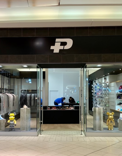 An inside look of Plus Shop brand store