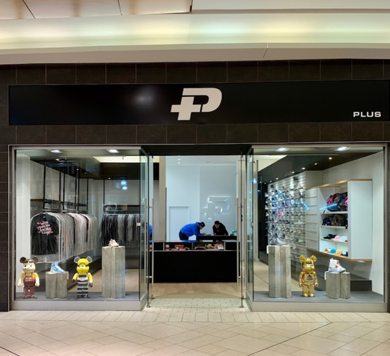 An inside look of Plus  Shop brand store
