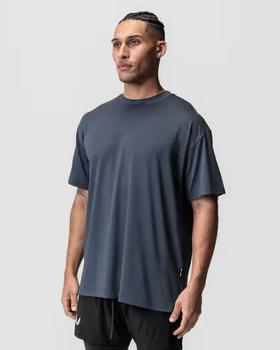 A man wearing asrv aerosilver® oversized tee - navy