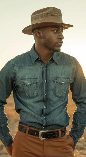 A man wearing Stetson medium blue denim shirt