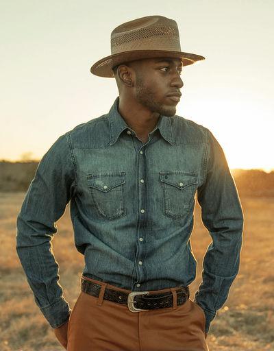 A man wearing Stetson medium blue denim shirt
