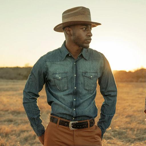 A man wearing Stetson medium blue denim shirt