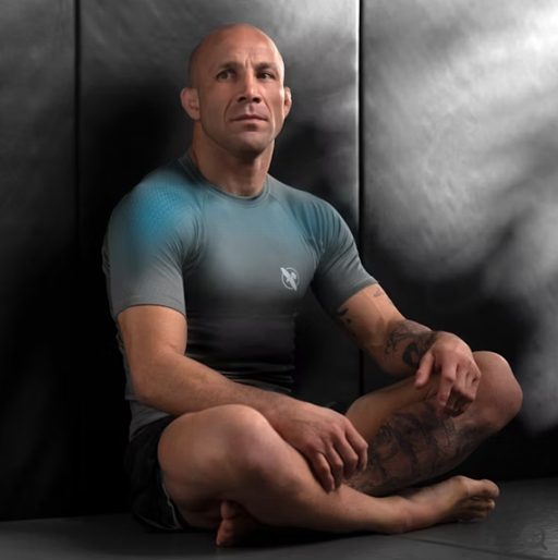 A man wearing hayabusa grey/aqua hayabusa fusion short sleeve rash guard