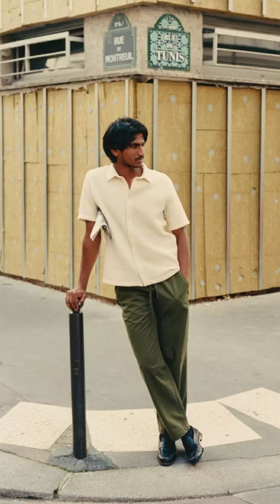 A man wearing Noyoco waffle shirt