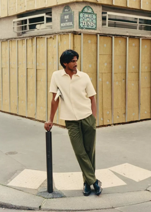 A man wearing Noyoco waffle shirt