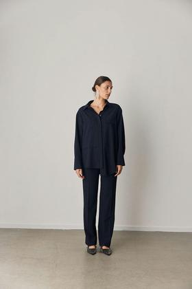 A woman wearing Iben soho shirt