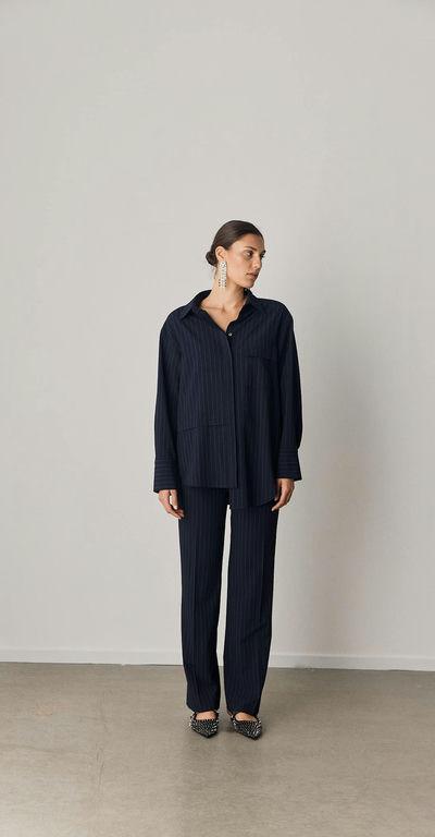 A woman wearing Iben soho shirt