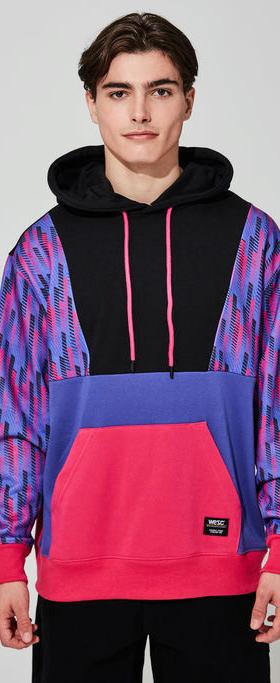 A man wearing WeSC multi racing stripes hoodie