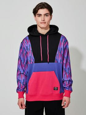 A man wearing WeSC multi racing stripes hoodie