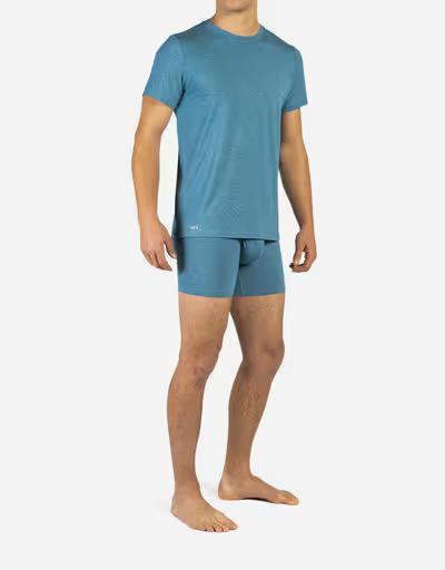 A man wearing BN3TH infinite tee shirt: deep water