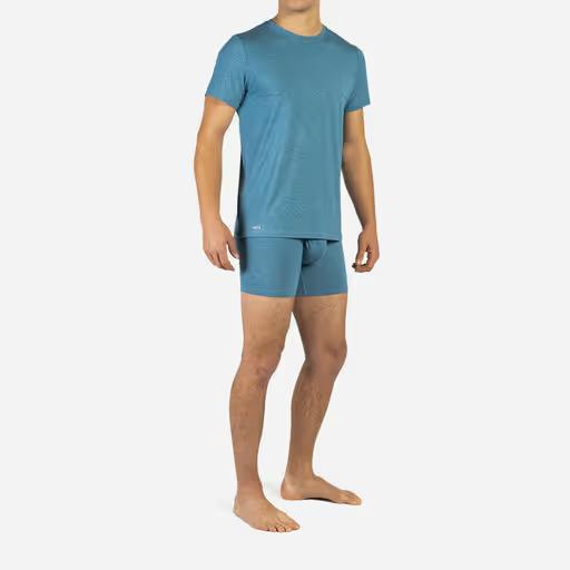 A man wearing BN3TH infinite tee shirt: deep water