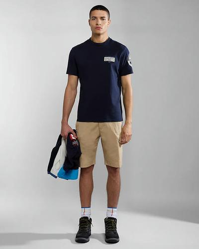 A man wearing Napapijri dark blue amundsen short sleeve t-shirt