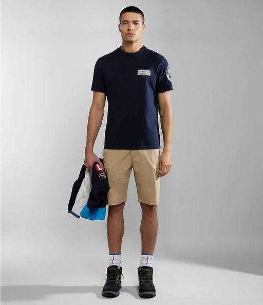 A man wearing Napapijri dark blue amundsen short sleeve t-shirt