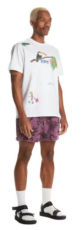 A man wearing Teddy Fresh white iguana tee