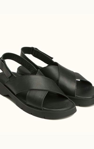 An image of Kleman black leather cross-strap sandals