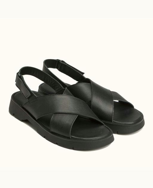 An image of Kleman black leather cross-strap sandals
