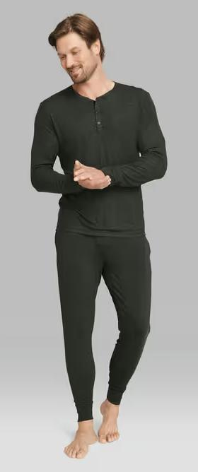 A man wearing Tommy John charcoal heather downtime henley pajama tee