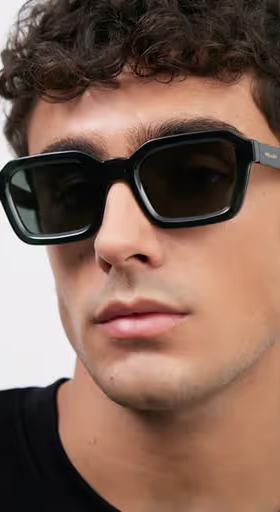 A man wearing Meller fog olive sunglass