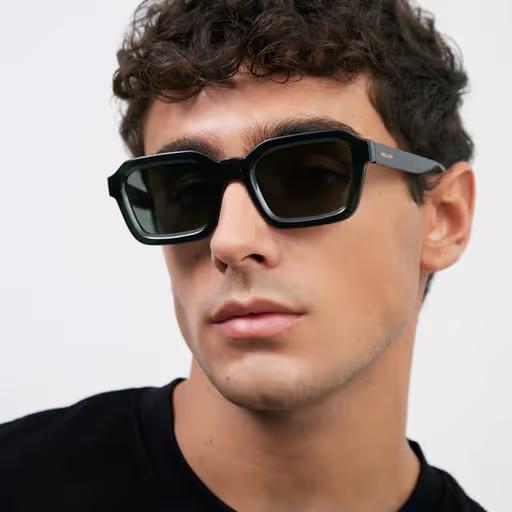 A man wearing Meller fog olive sunglass
