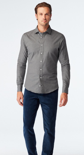 A man wearing Indochino dilham melange charcoal casual shirt