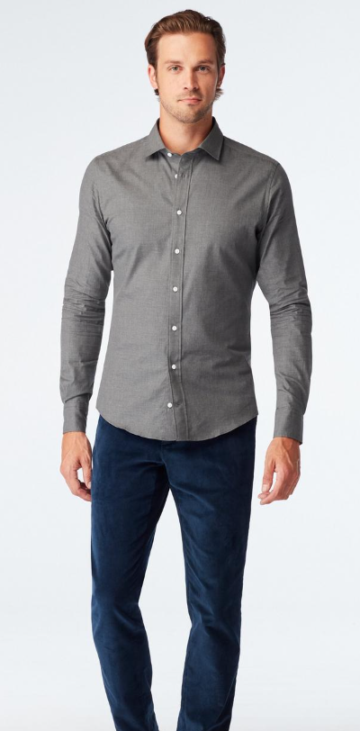 A man wearing Indochino dilham melange charcoal casual shirt