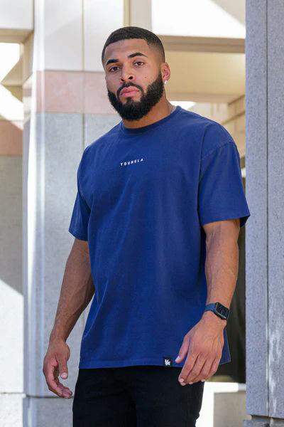 A man wearing YouthLA essential jacked tees - blue