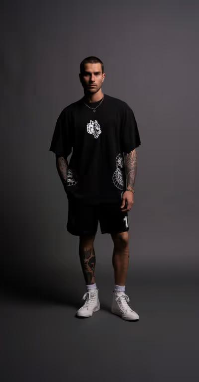 A man wearing Darc Sport perfect form "Premium" oversized tee in black