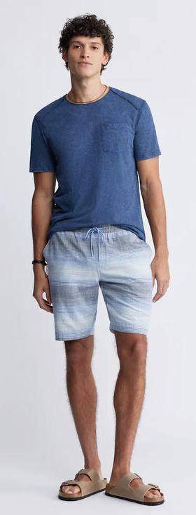 A man wearing Buffalo kamizo men's pocket t-shirt in whale blue