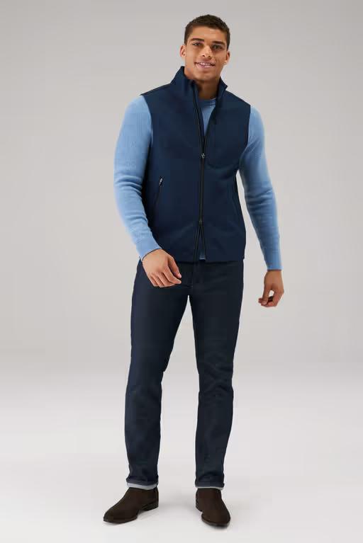 A man wearing Mack Weldon true navy heather latitude vest