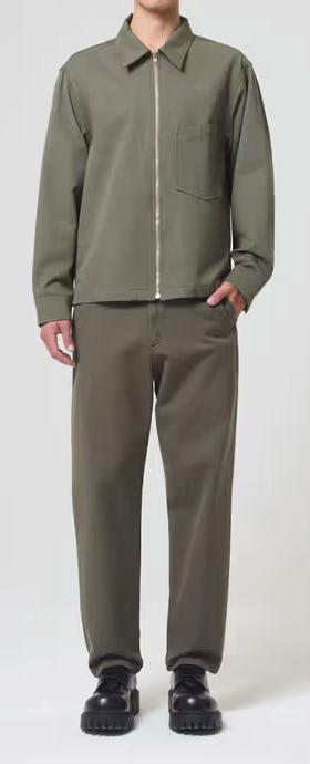 A man wearing AGOLDE moss color vinson chino shirt